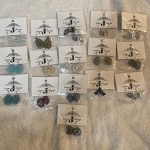 17 pair of new in package earrings